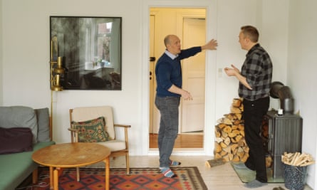 It’s a jungle in there ... Rob Dunn (left) explores Lars Eriksen’s home in Copenhagen. Photograph: Marie Hald/The Guardian