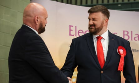Labour’s Chris Webb shakes hands with Conservative candidate David Jones.