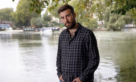 Michael Doughty, Swindon Town’s main sustainability officer, successful beforehand of a river.