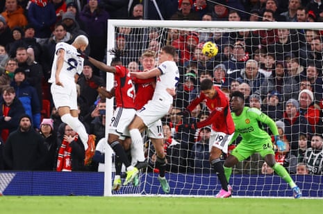 Tottenham Hotspur's Richarlison scores their first goal past Manchester United's Andre Onana.