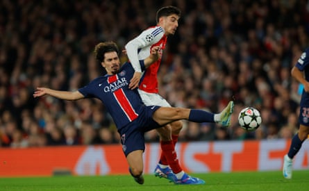 PSG’s Vitinha tackles Arsenal’s Kai Havertz during a Champions League group game in October.