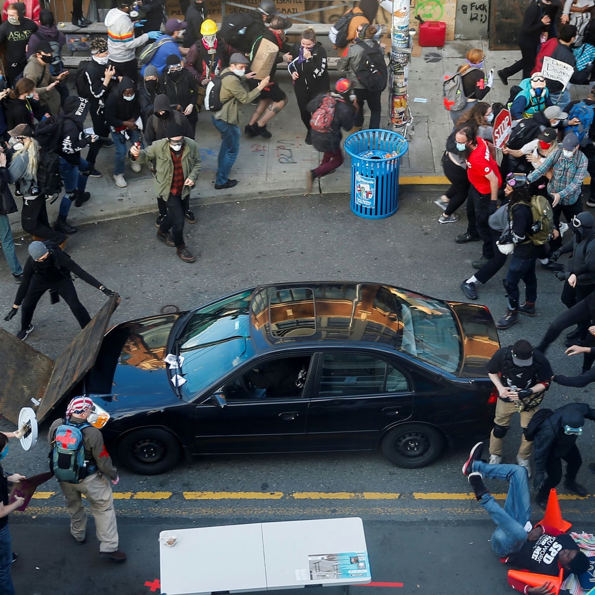 Protesters Across Us Attacked By Cars Driven Into Crowds And Men With Guns Us News The Guardian