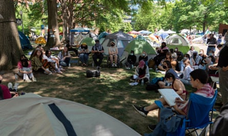 George Washington University students gather at the plaza encampment as they protest against the Israel-Hamas war.