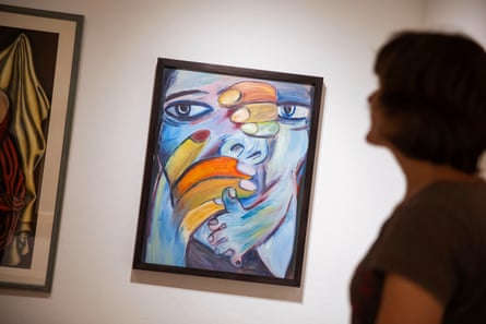 Painting of hands covering a woman’s face