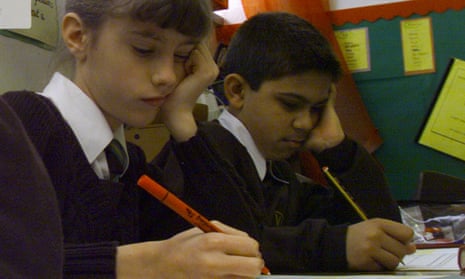 Pupils writing in class