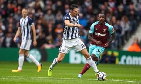 West Brom’s Gareth Barry takes control of possession against West Ham.