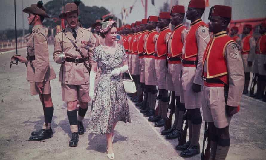 Queen Elizabeth II inspects men of the newly renamed Queen’s Own Nigeria Regiment, Royal West African Frontier Force, at Kaduna Airport, Nigeria, during her Commonwealth Tour in 1956.