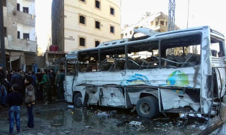 The aftermath of a bomb attack on Sayyda Zeinab, Damascus, on Sunday.