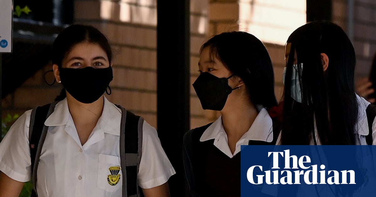 NSW education officials unmoved on return of masks in schools despite surging Covid infections