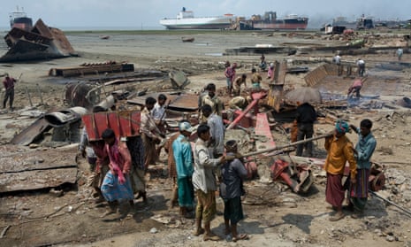 Shipbreakers cut up a beached vessel for scrap in Chittagong, Bangladesh.