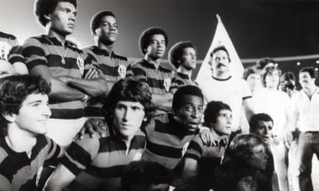 Pelé lines up alongside Zico and the Flamengo team during a charity match in 1979 in Rio de Janeiro