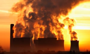 The sun rises behind Fiddlers Ferry coal-fired power station near Liverpool, northern England