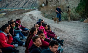 A group of migrants in Sunland Park, New Mexico, where the United Constitutional Patriots, an armed rightwing militia, patrol the US-Mexico border. 5000.jpg?width=300&quality=85&auto=forma