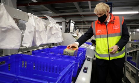 Boris Johnson visting a Tesco distribution centre in London this afternoon.