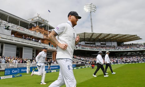 Ben Stokes leads the England team out.