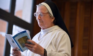 A nun reads Laudato Si'