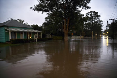 Rising floodwaters in Raymond Terrace on Tuesday evening.