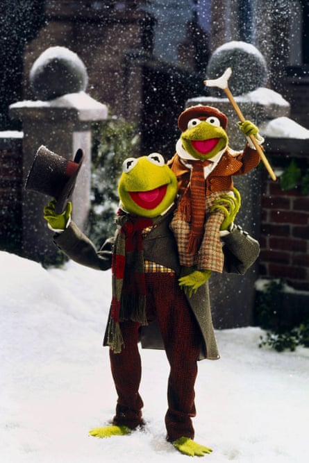 Bob Cratchit (Kermit) with Tiny Tim (Robin the Frog) in The Muppet Christmas Carol.
