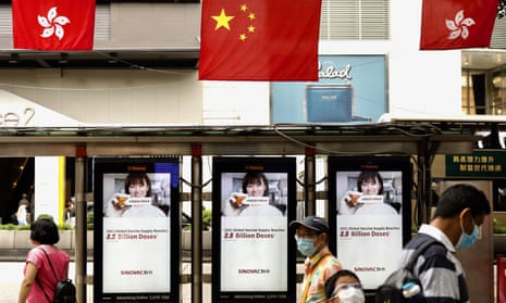 A display by the Chinese Covid-19 vaccine supplier Sinovac at a bus station in Hong Kong