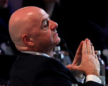 Gianni Infantino sits with his hands together in March 2025