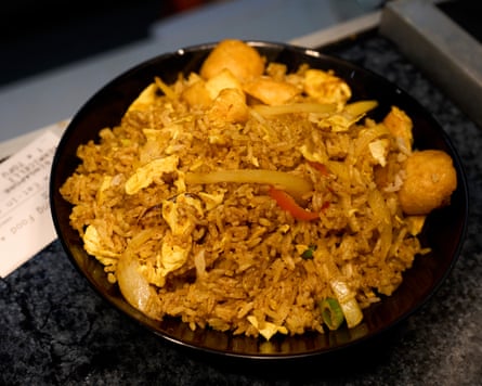 A close up of a bowl of a Malaysian rice dish.