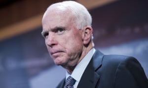 John McCain attends a news conference in the Capitol introducing a bipartisan bill to increase sanctions on Russia.