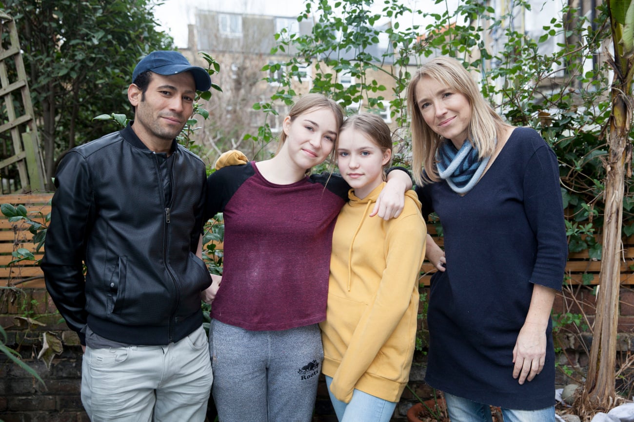 Mohammed, 34, Palestine seen in back garden with Eve, 14, Malila, 12 and host Jo