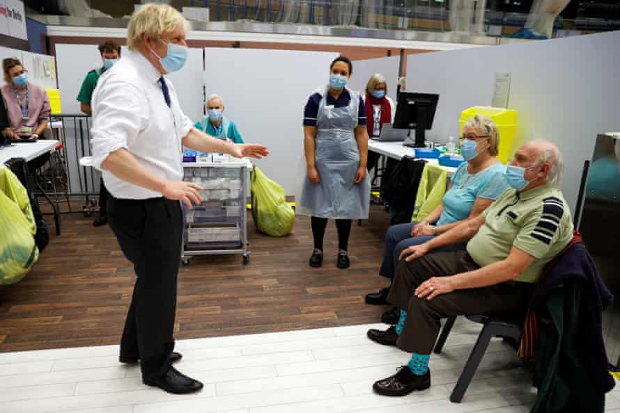 Prime Minister Boris Johnson Visits Vaccination Centre In DerbyDERBY, ENGLAND - FEBRUARY 08: Prime Minister Boris Johnson visits a vaccination centre at the Derby Arena velodrome on February 7, 2021 in Derby, England. (Photo by Phil Noble - WPA Pool/Getty Images)