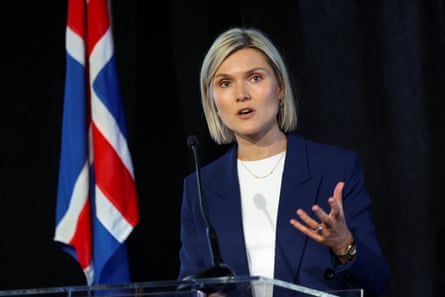 a woman in front of a microphone