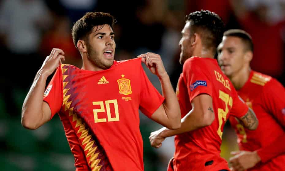 Marco Asensio celebrates after scoring Spain’s second goal in Elche.