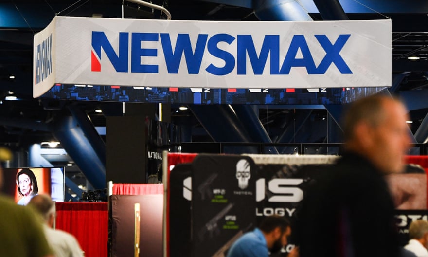The Newsmax booth at the NRA convention in Houston in May.