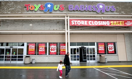 Customers leaving a Toys R Us store in March 2018 in Emeryville, California. The company filed for liquidation that month, leading to 33,000 people in the US losing their jobs.