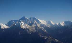 Mount Everest, the world highest peak, and other peaks of the Himalayan range are seen through an aircraft window during a mountain flight from Kathmandu, Nepal January 15, 2020.