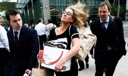 Employees walk away from the offices of Lehman Brothers