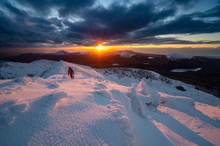 Mountaineer in the snow, snowdonia, yr wydffa