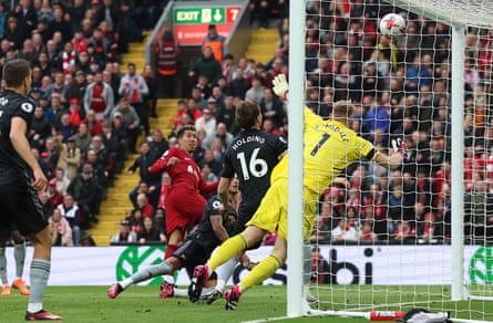 Roberto Firmino scores Liverpool’s late equaliser in a 2-2 draw with Arsenal at Anfield