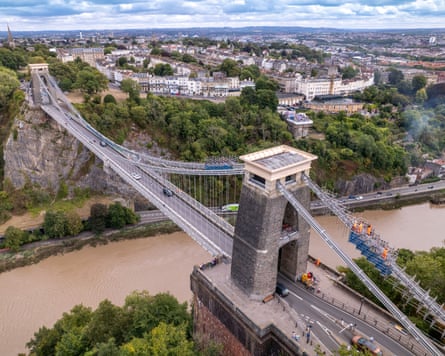 The Clifton Suspension Bridge viewed from above stretching over the river towards Bristol.
