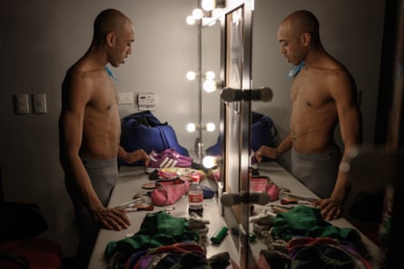 Ballet dancer Juan Pablo Rodriguez reflected in a stage mirror