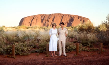 Prince Charles and Diana, Princess Of Wales standing in front of Ayers Rock/Uluru during their official tour of Australia, on 21 March 1983.
