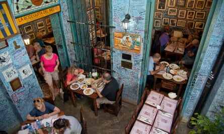 Cuban meals … diners at a restaurant in Havana. La Bdel M, Old Havana, Cuba.