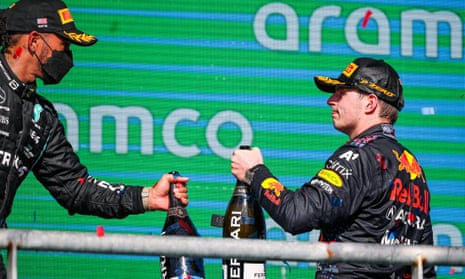 Max Verstappen celebrates his victory in the US Grand Prix in October, alongside Lewis Hamilton
