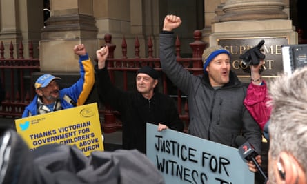Protesters celebrate outside of the supreme court of Victoria