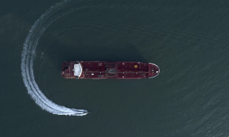 An aerial view shows a speedboat of Iran’s Revolutionary Guard moving around the British-flagged oil tanker Stena Impero.