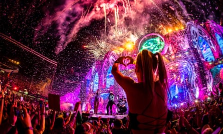 A neon lit stage at Untold festival