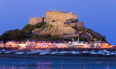 Mount Orgueil Castle overlooking Grouville Bay in Gorey, Jersey. The island looks prosperous but is going broke.