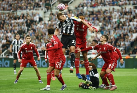 Newcastle’s Dan Burn competes pinch nan shot pinch Liverpool’s Virgil van Dijk.