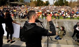 Protesters marching in solidarity with protests in the United States in Adelaide, Australia. Police gave special permission for the protest to proceed despite coronavirus restrictions.