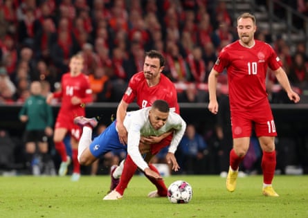 World Cup 2022 team guides part 14: Denmark | Denmark 5 Thomas Delaney gets to grips with Kylian Mbappé as Christian Eriksen closes in during Denmark’s victory over France at Parken Stadium in September.