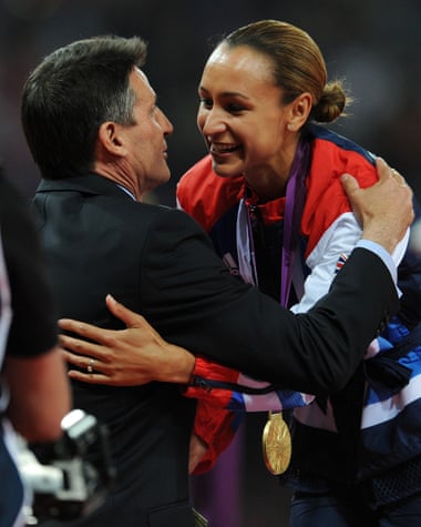 Sebastian Coe congratulates Jessica Ennis-Hill on the podium after the athlete won gold for Great Britain in the women's heptathlon.