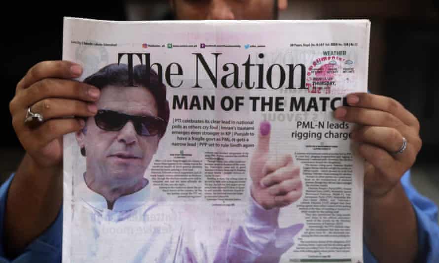 A Pakistani newspaper shows Imran Khan, head of Pakistan Tehrik-e-Insaf, on the front page a day after general elections